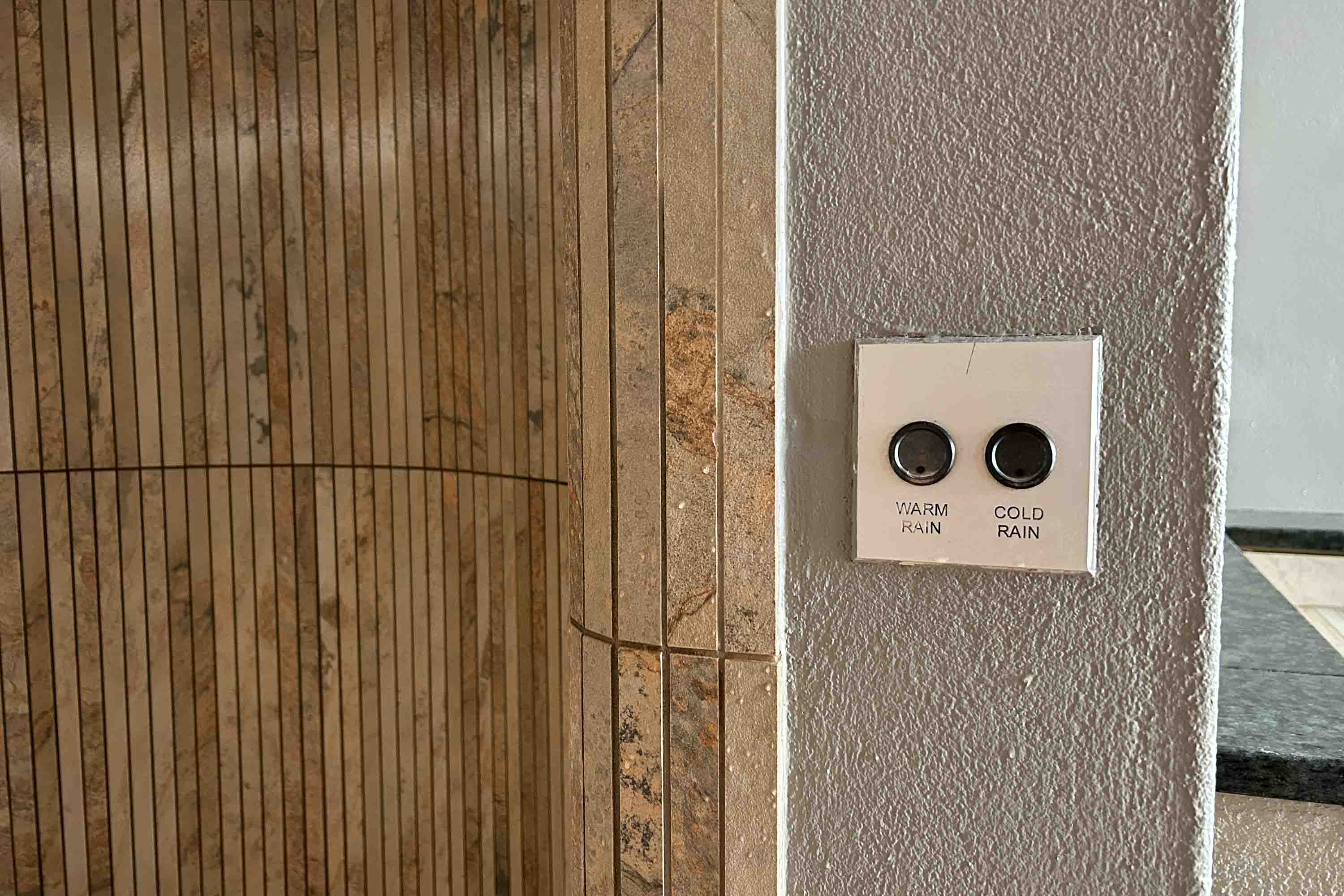 upplevelsedusch knappar